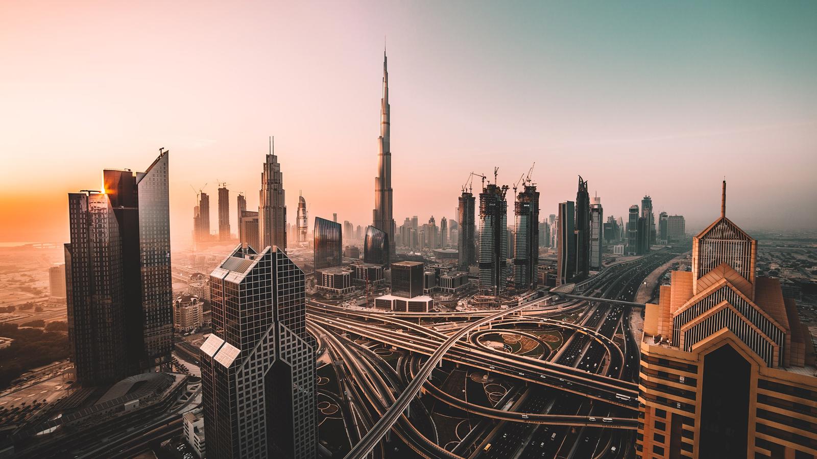 a city with many roads and skyscrapers