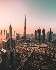 a city with many roads and skyscrapers
