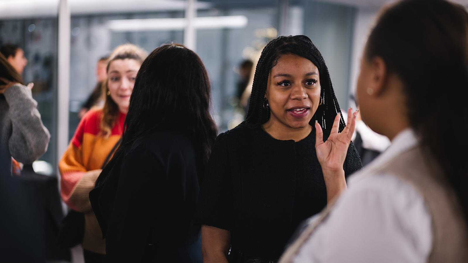 a group of women standing in a line