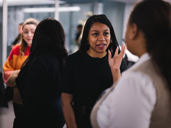 a group of women standing in a line