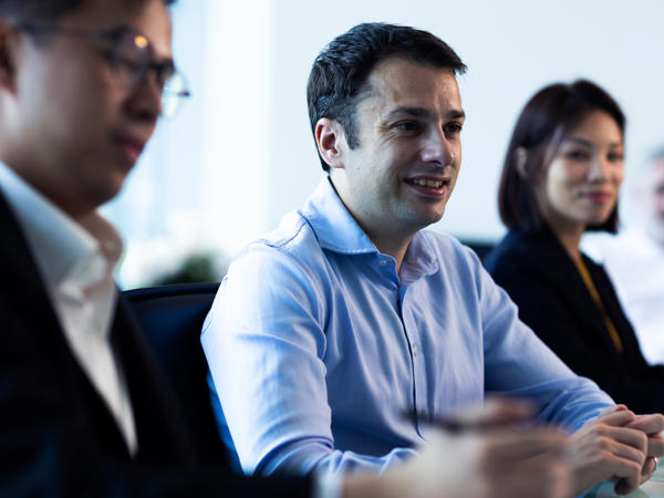 a group of people sitting in a room