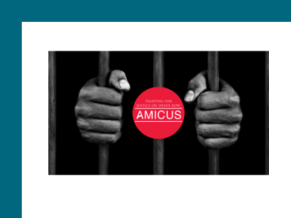 hands holding bars with a red circle
