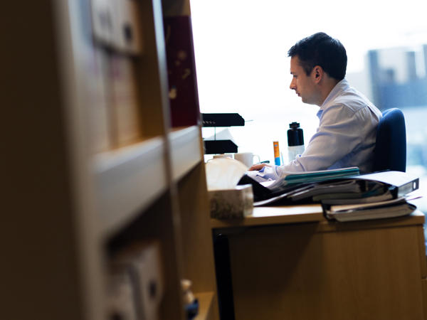 a man sitting at a desk