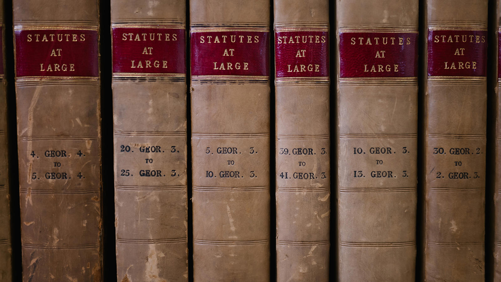 a row of books with red labels