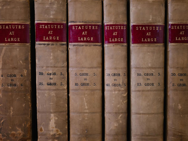 a row of books with red labels