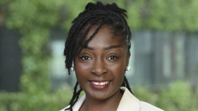 a woman smiling at the camera