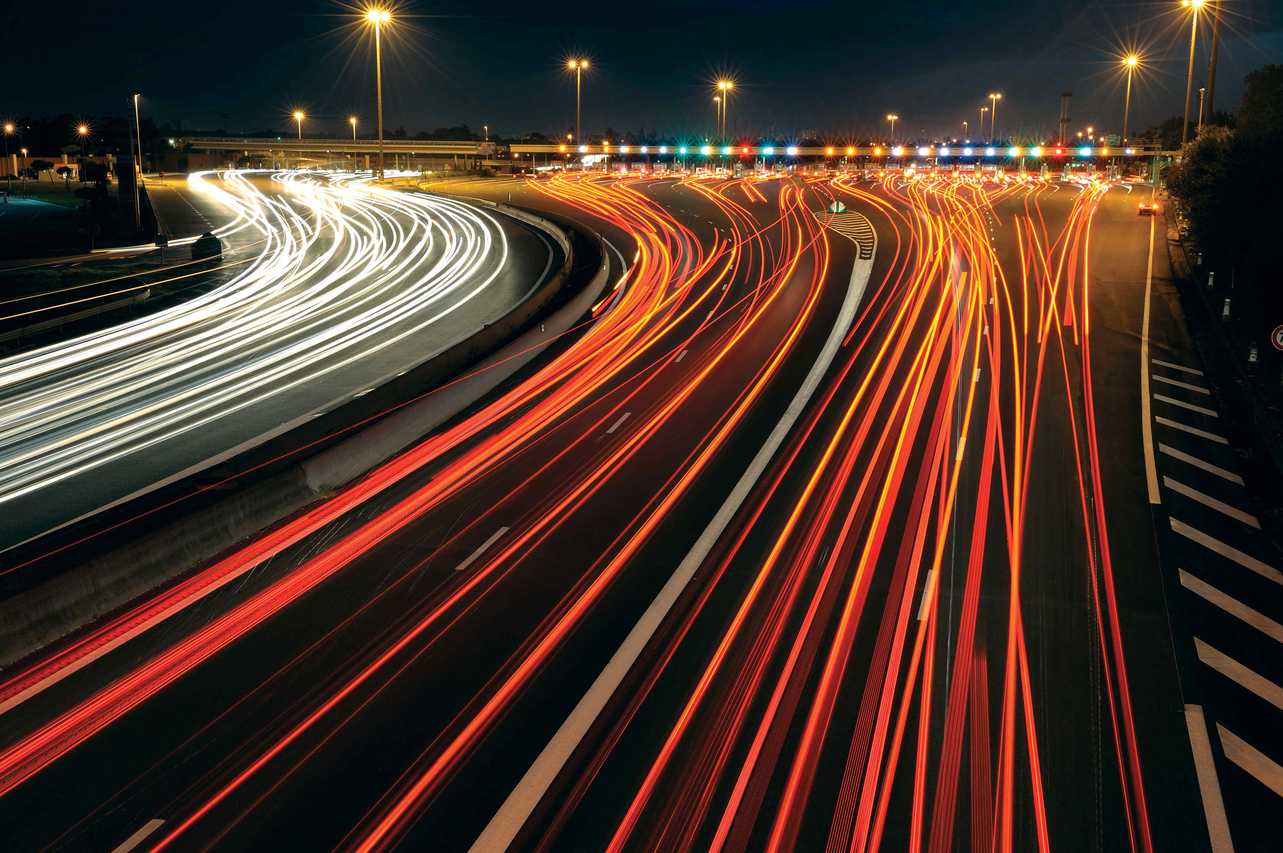 a highway with lights on