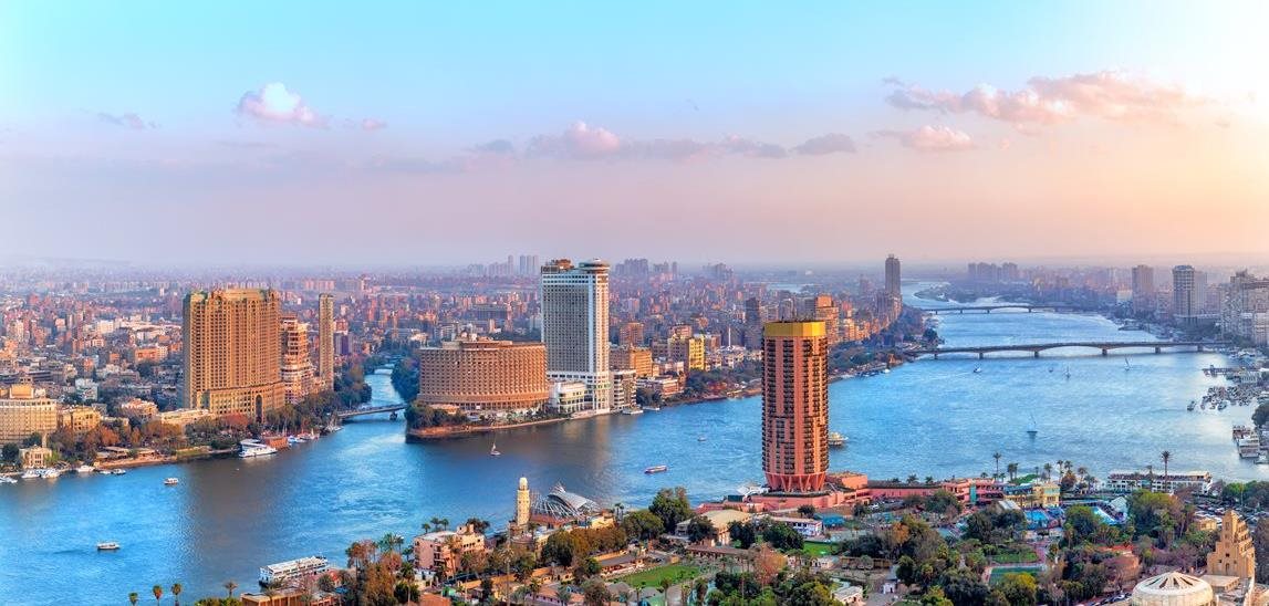 a city with a river and buildings