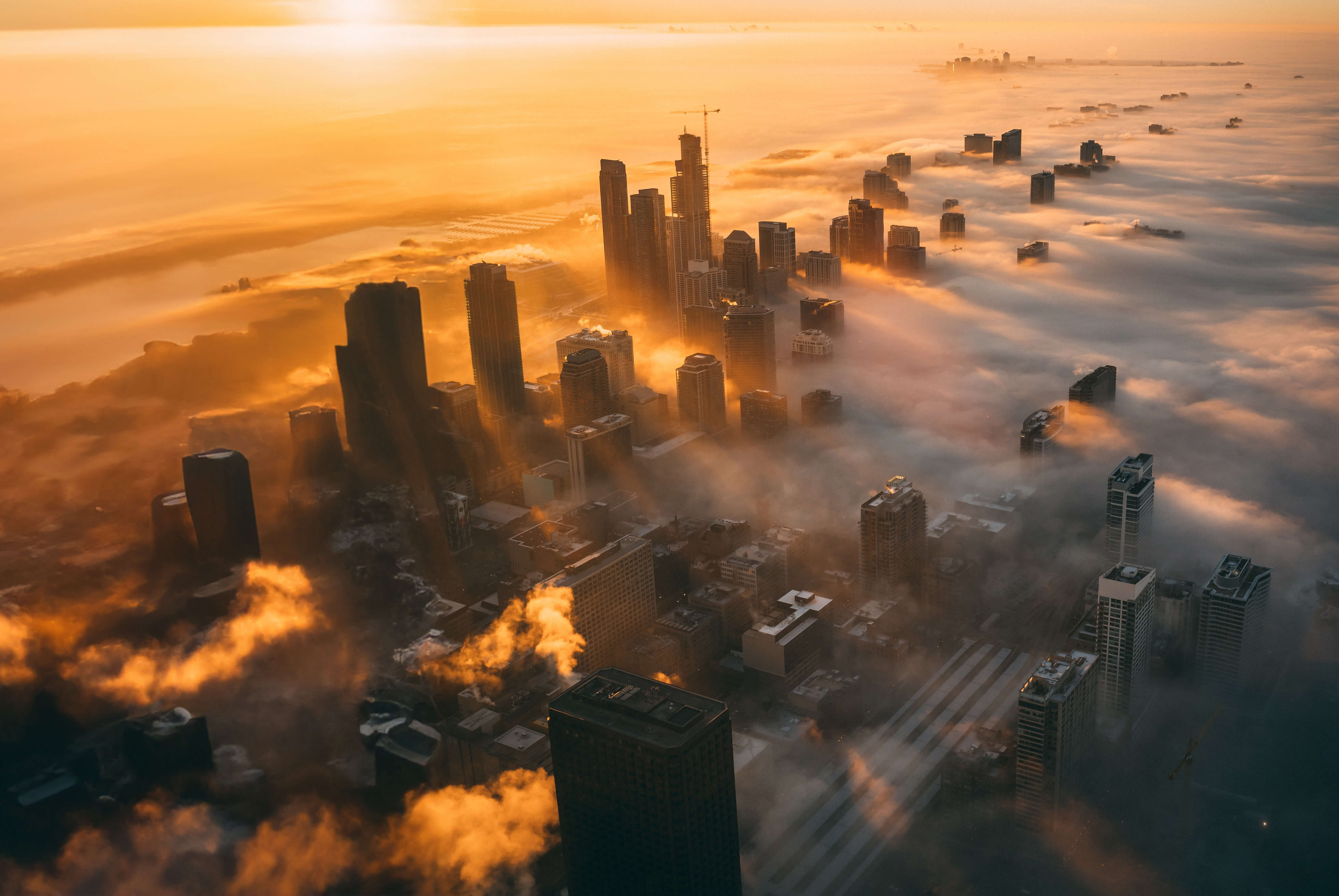 a city with clouds in the sky