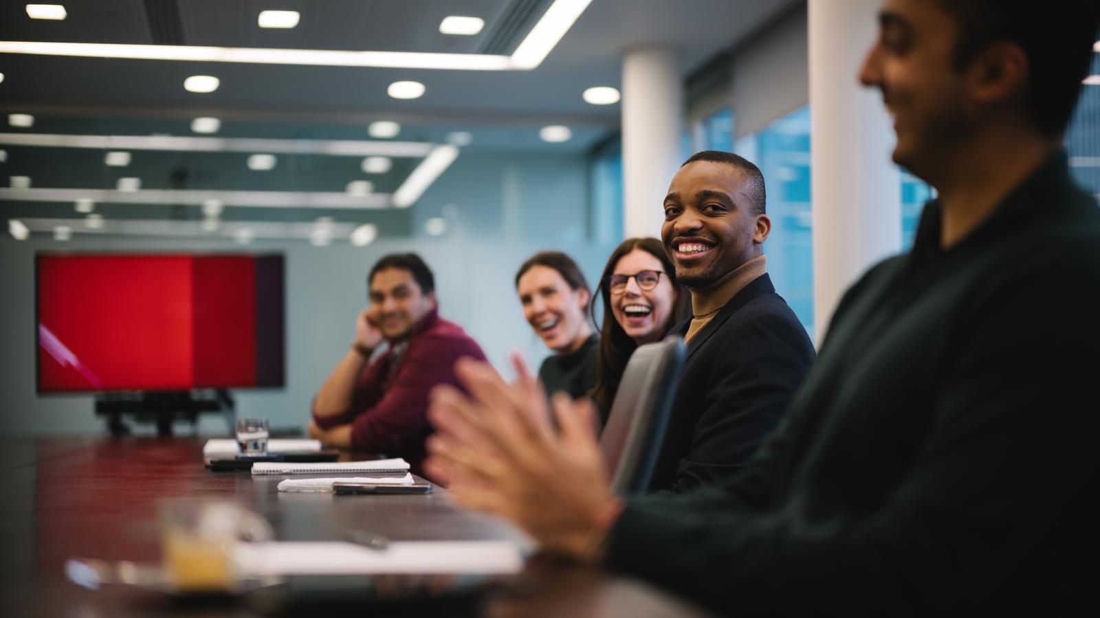 a group of people sitting at a table