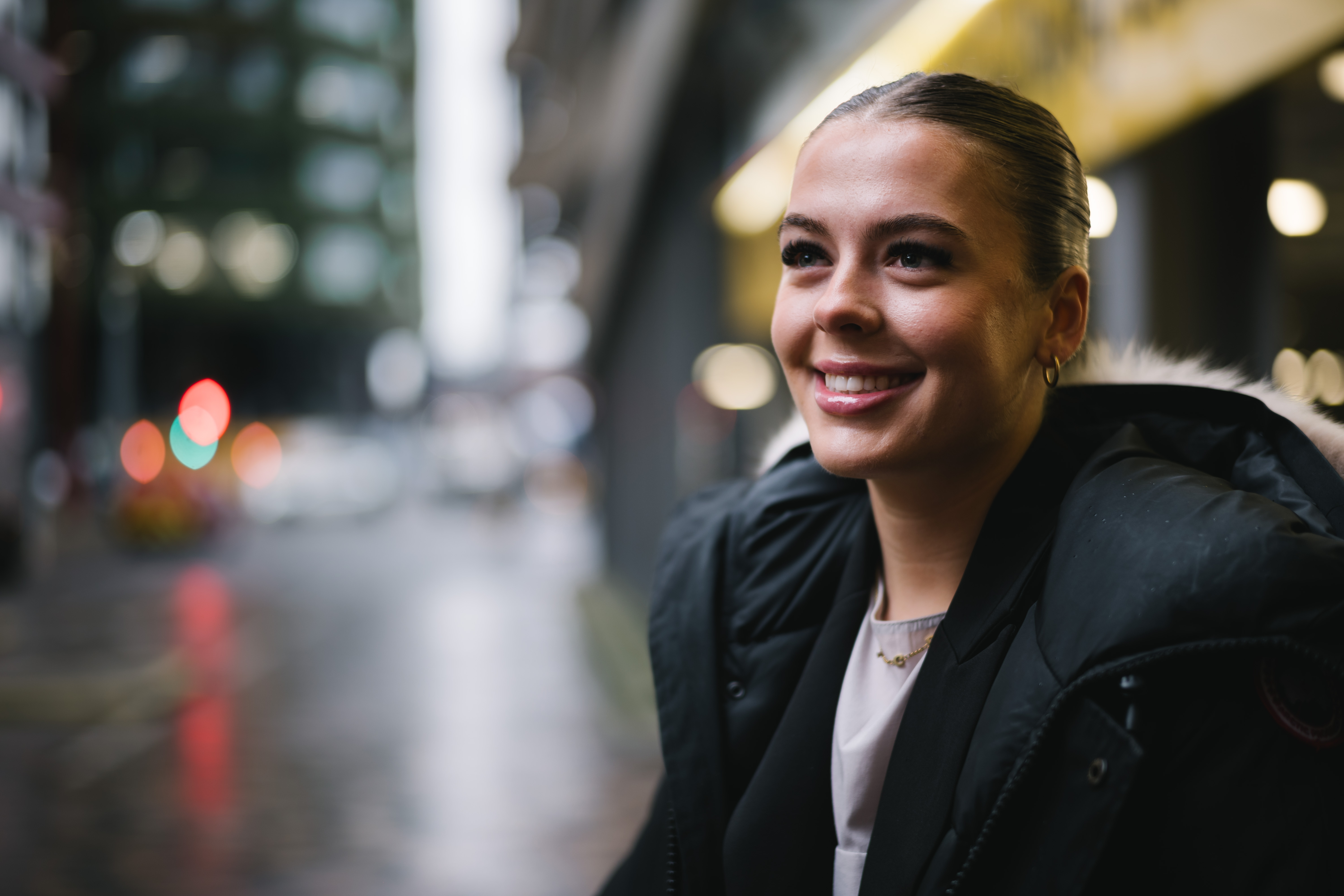 a woman smiling at the camera