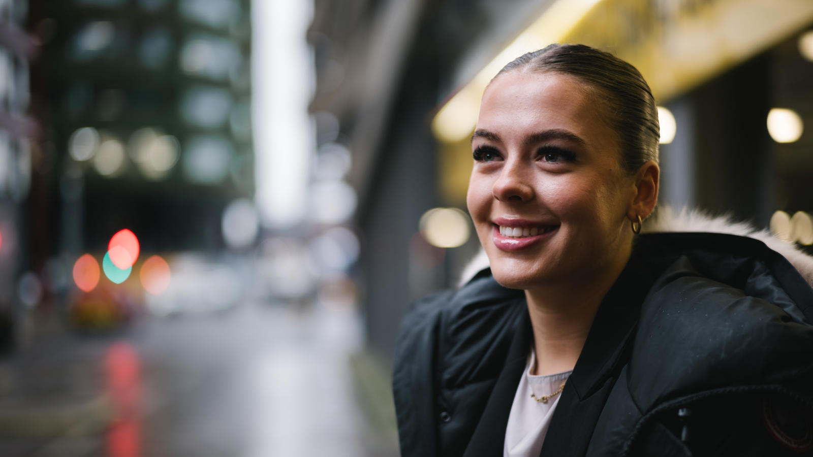 a woman smiling at the camera