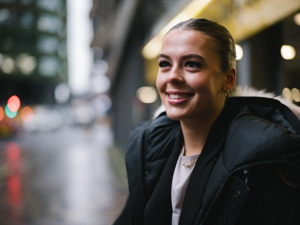 a woman smiling at the camera