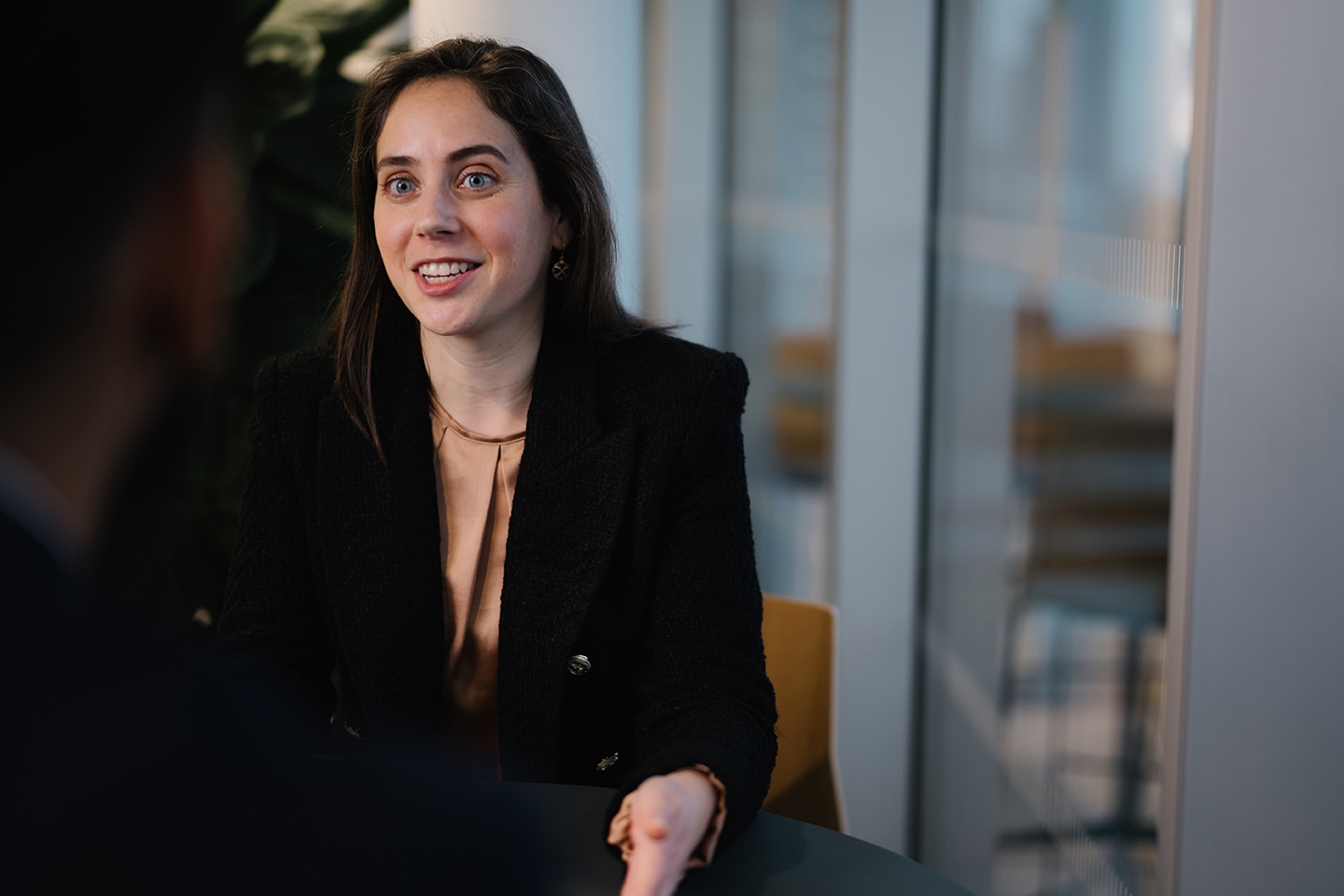 a woman sitting at a table