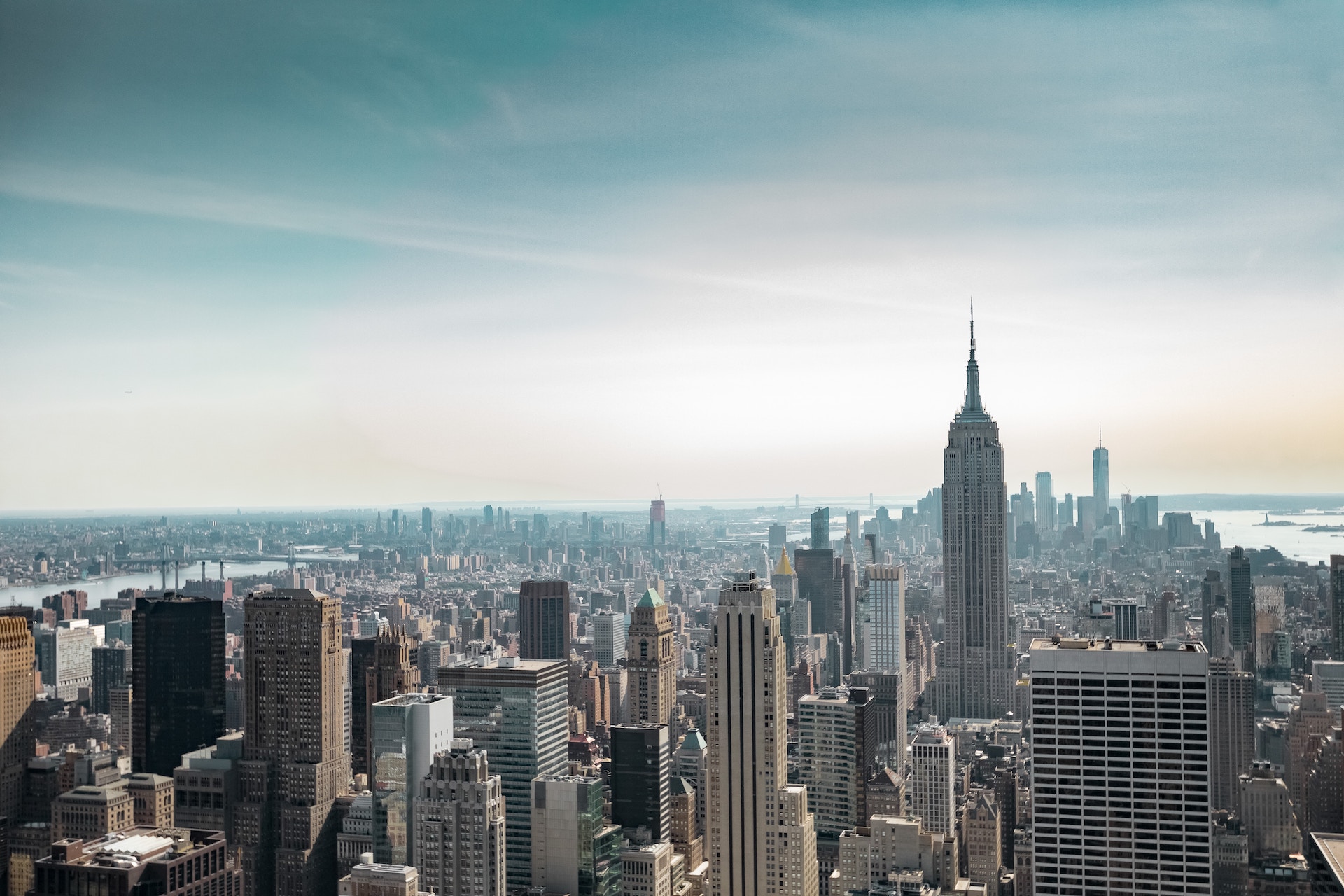 a city skyline with tall buildings