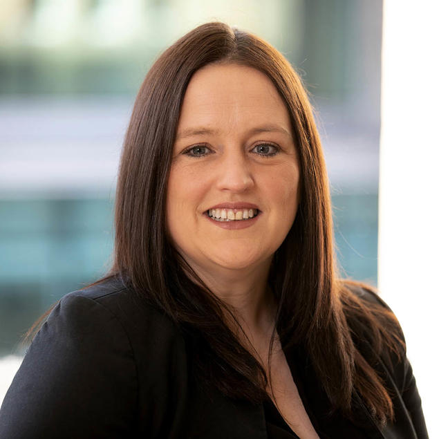 a woman smiling at camera