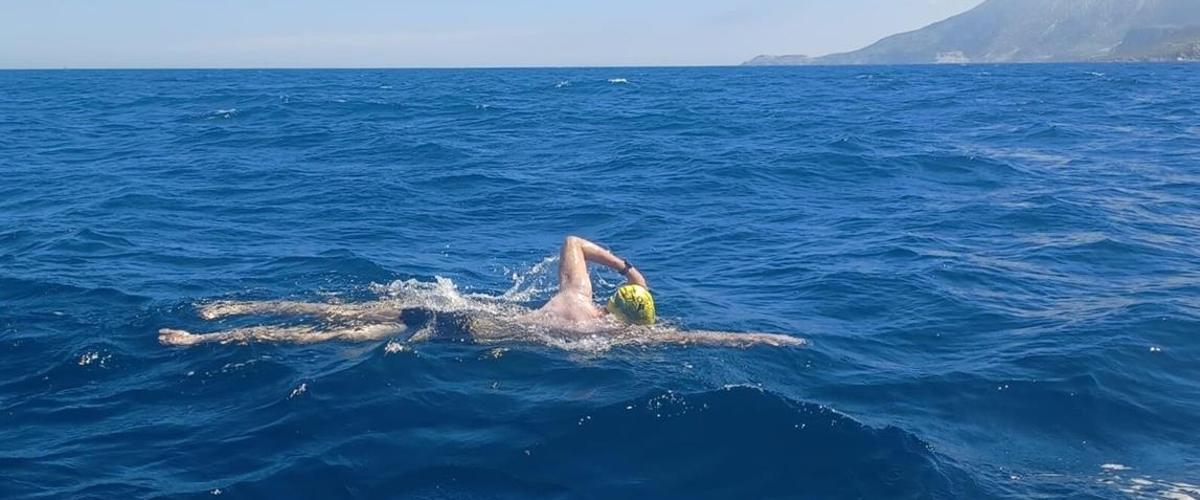a man swimming in the water