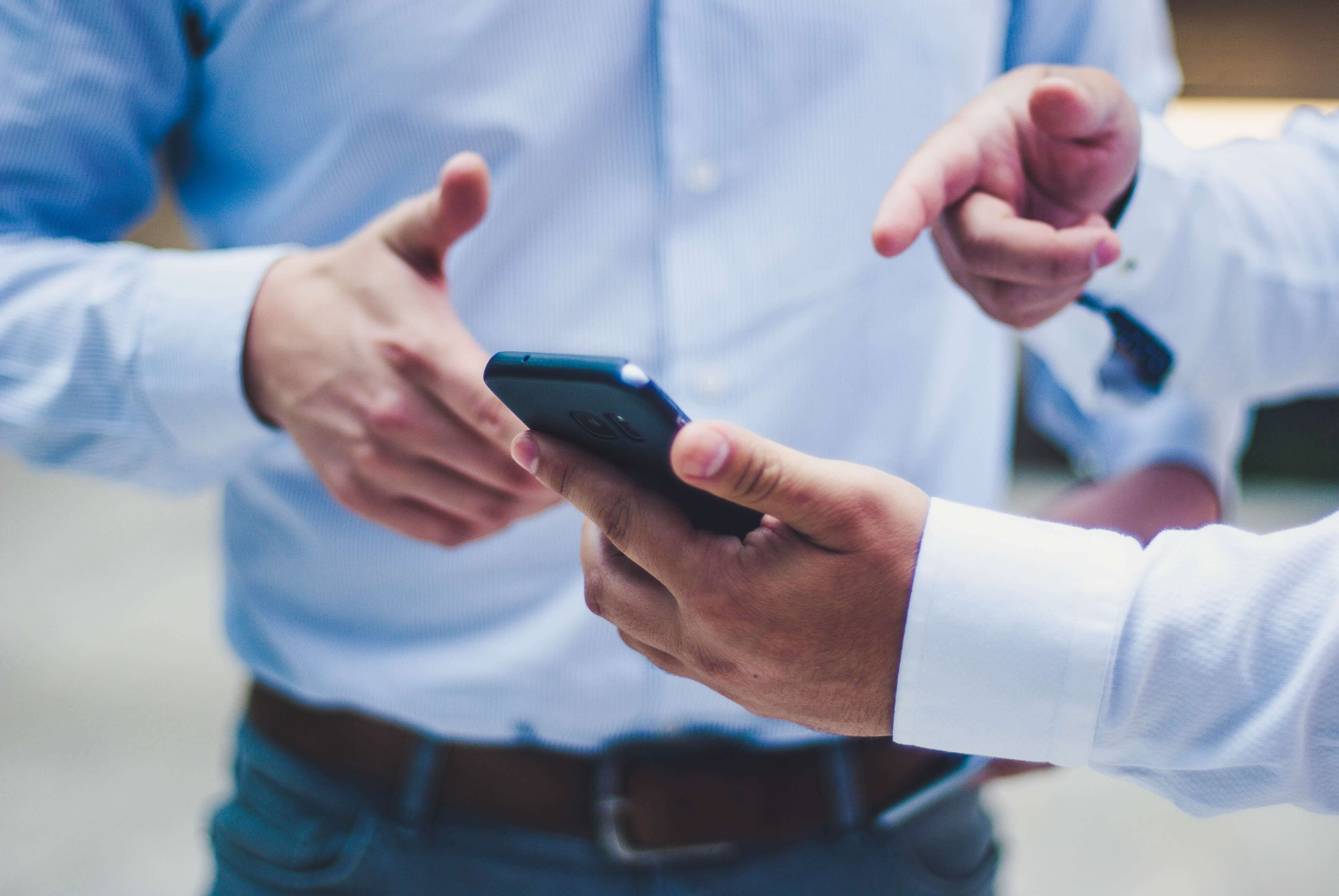 a man holding a phone