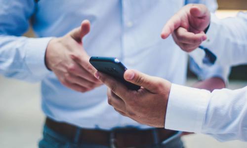 a man holding a phone