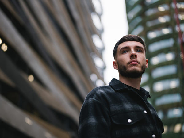 a man looking up to the side
