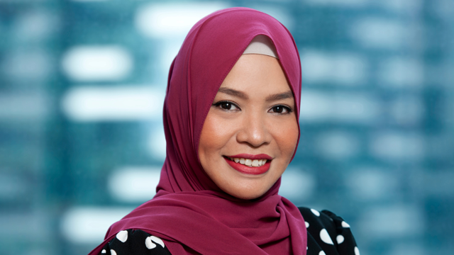 a woman wearing a red head scarf