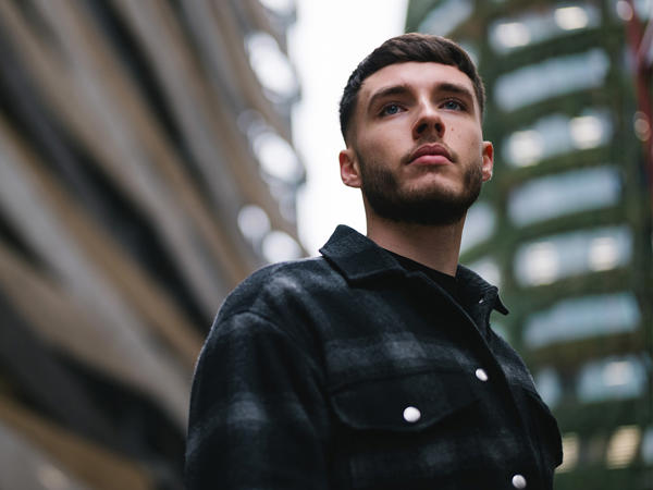 a man looking up to the side