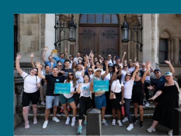 a group of people posing for a photo