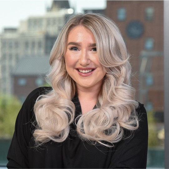 a woman with long blonde hair