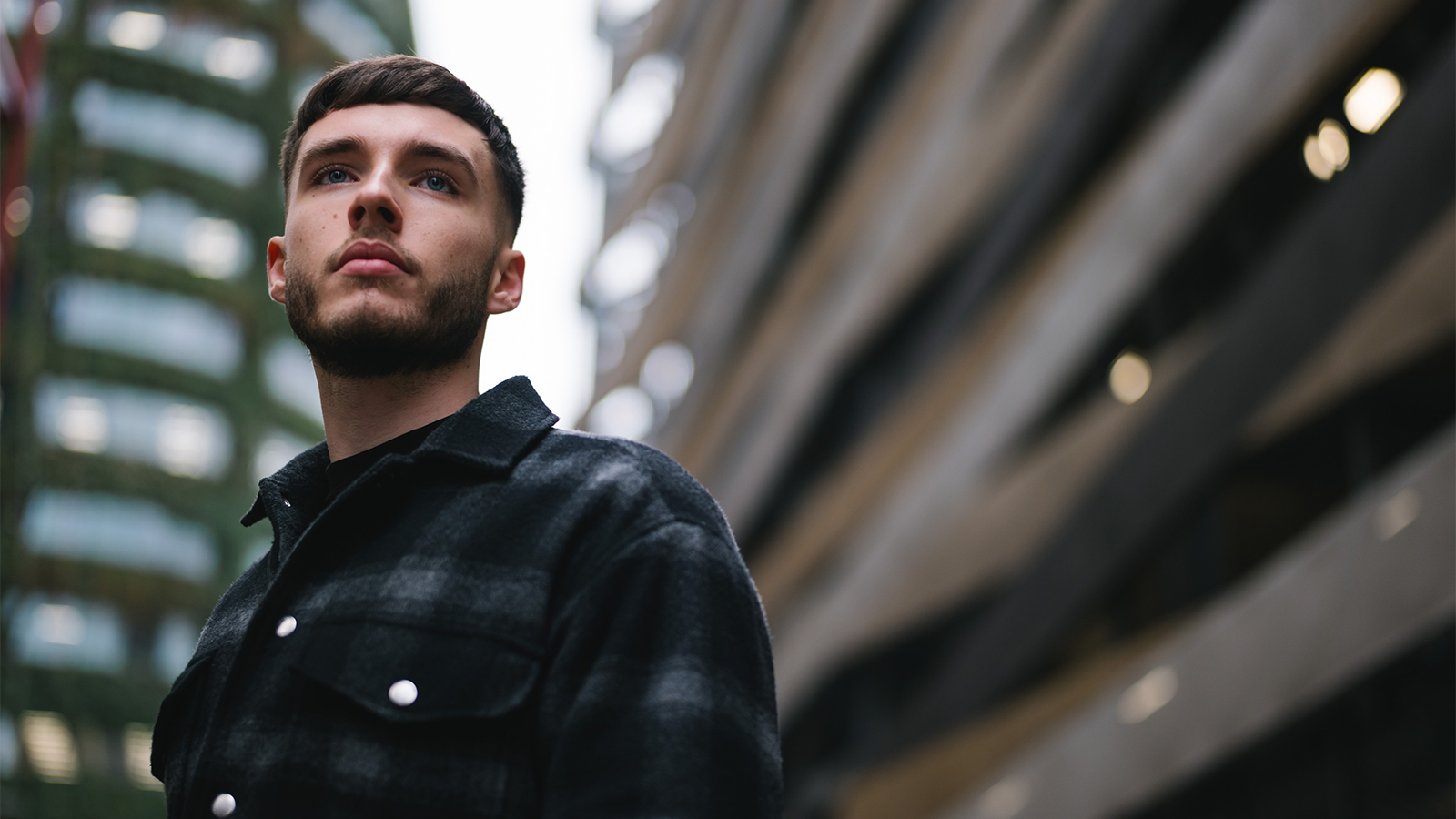 a man looking up to the side