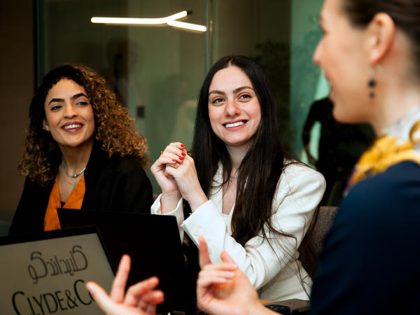 a group of women sitting at a table