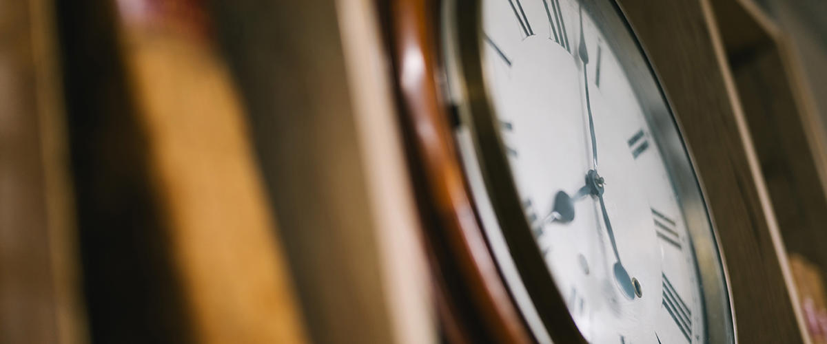 a clock on a shelf