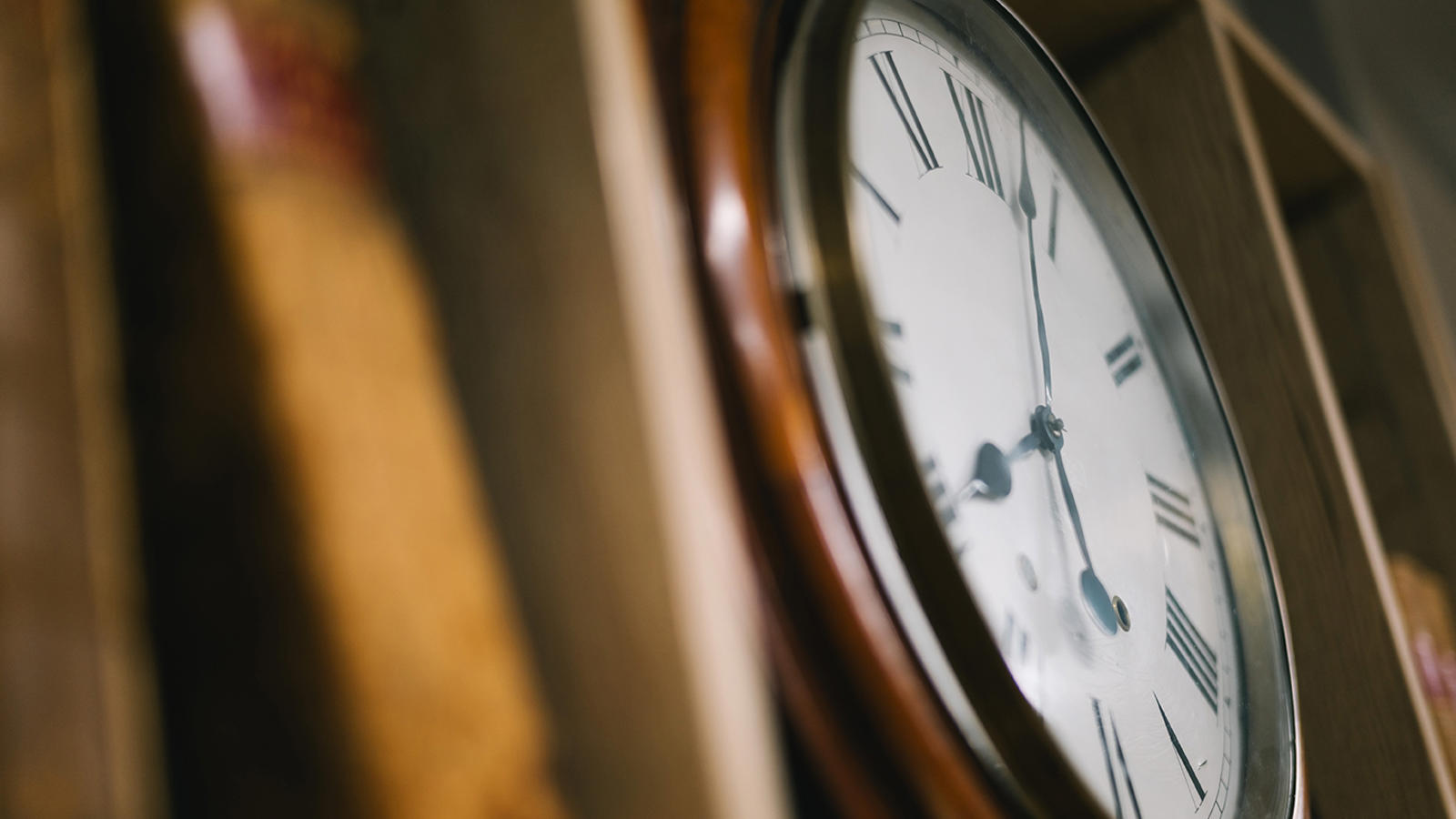 a clock on a shelf