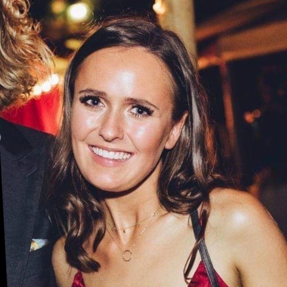 a woman smiling at camera