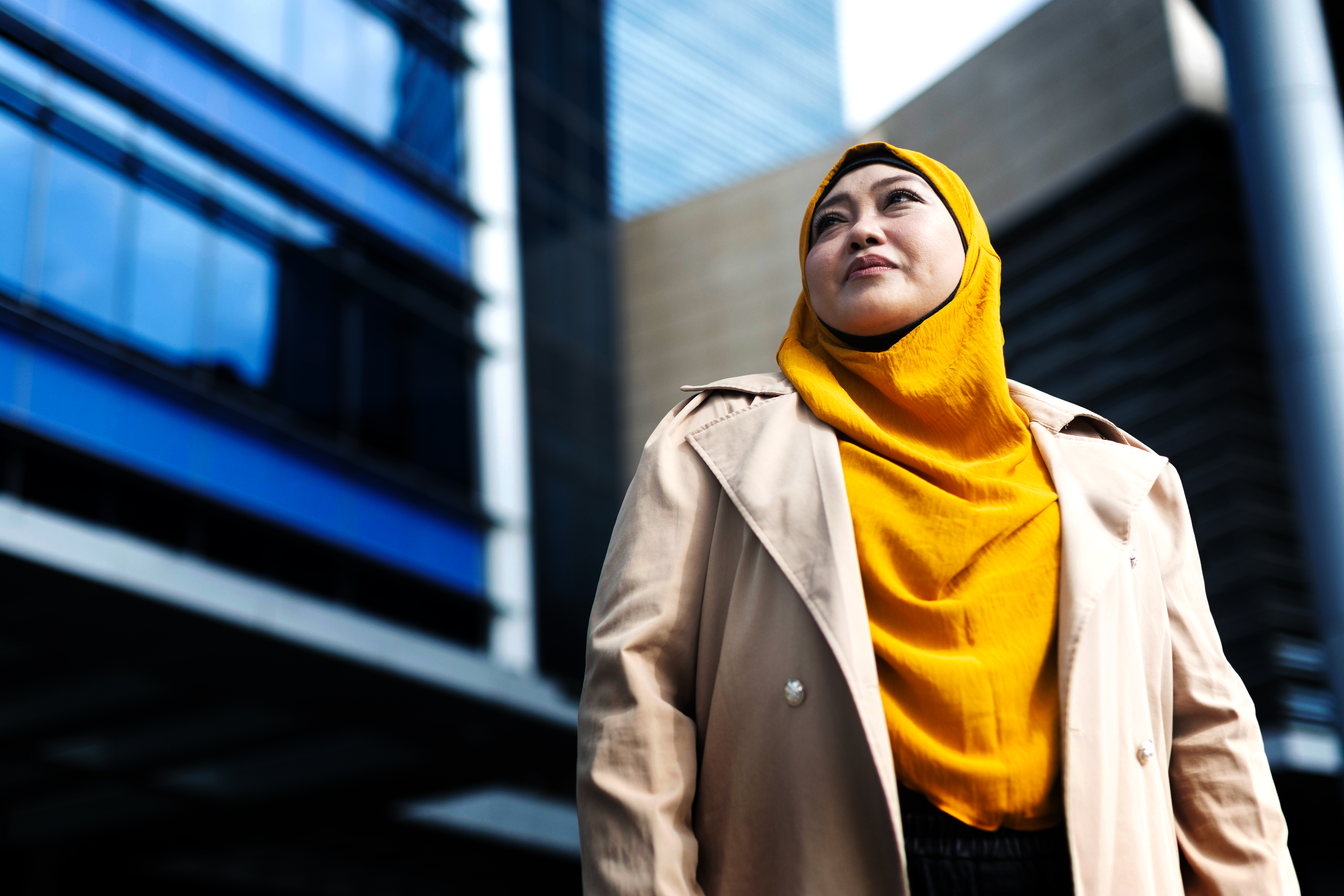 a woman in a yellow scarf