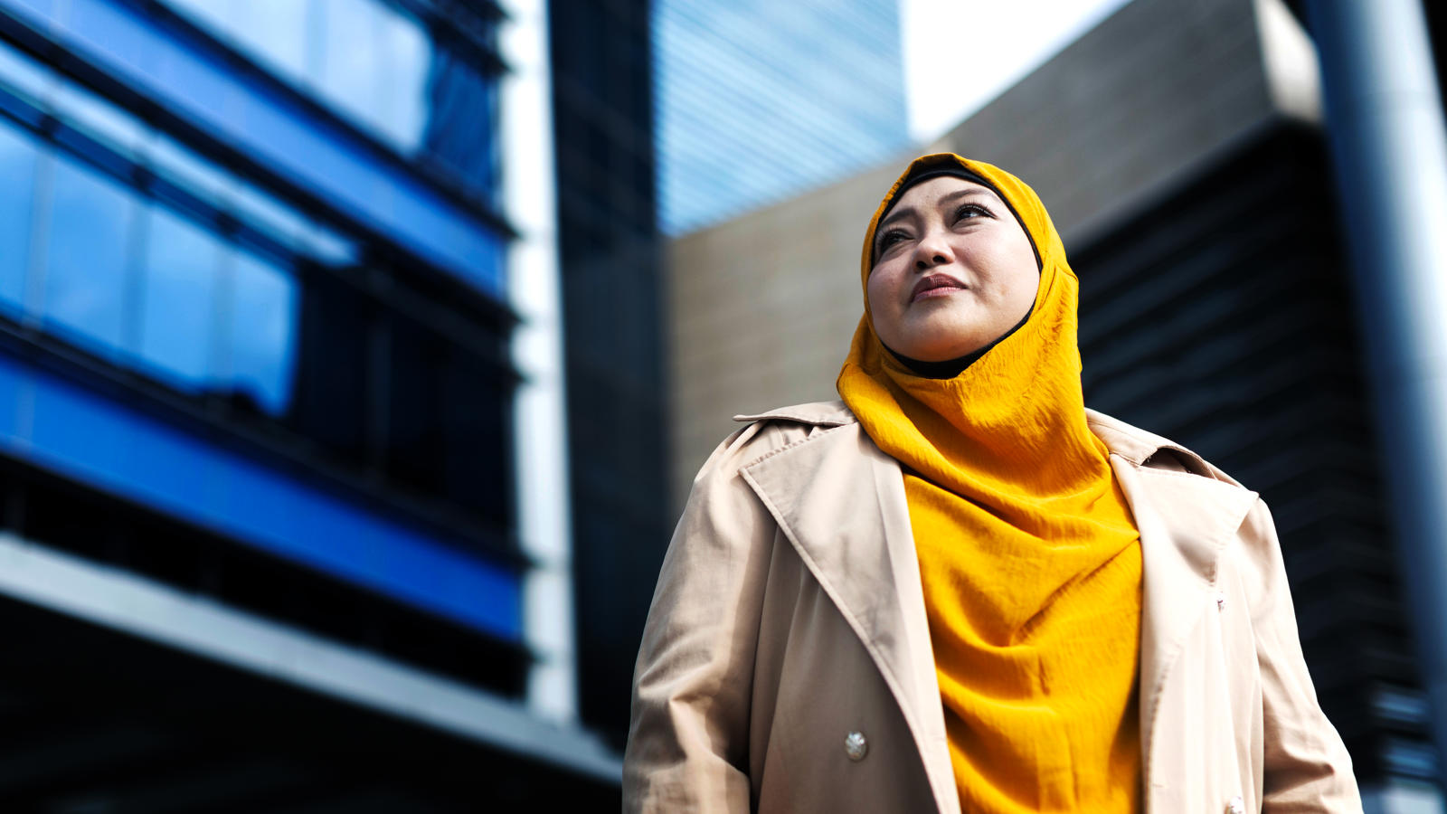 a woman in a yellow scarf