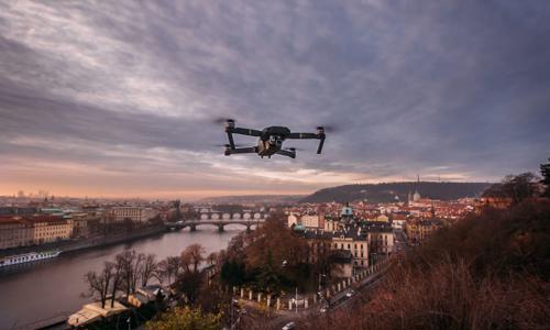 a drone flying over a city