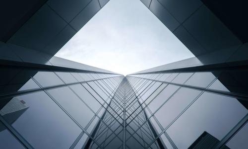 looking up view of a tall building