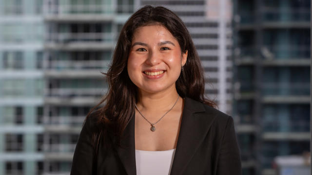 a woman smiling at camera