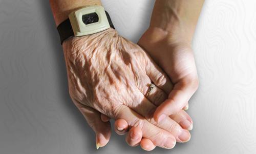 a close-up of hands holding each other