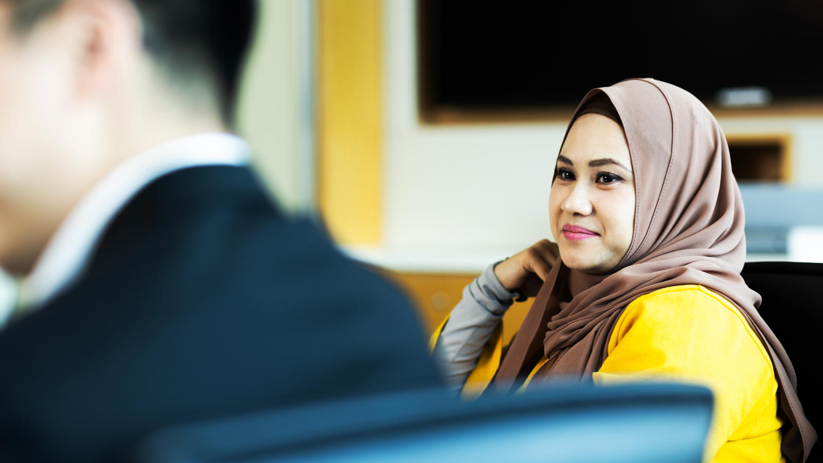 a woman wearing a head scarf