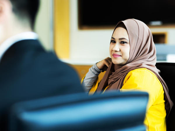 a woman wearing a head scarf