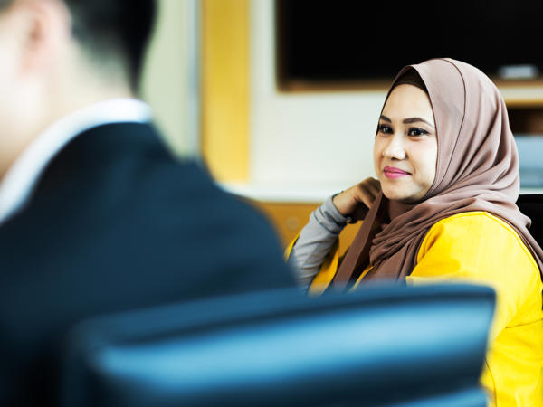 a woman wearing a head scarf